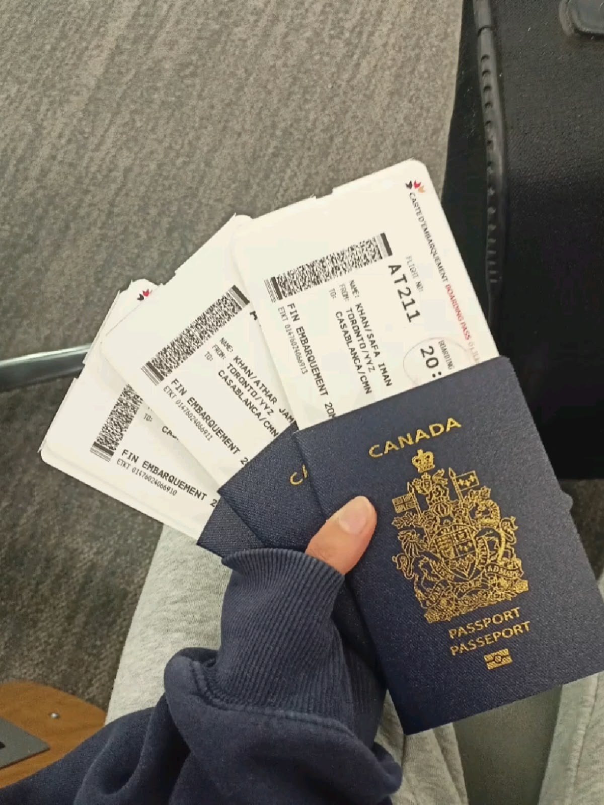 Canadian passport and travel papers pictured during a journey